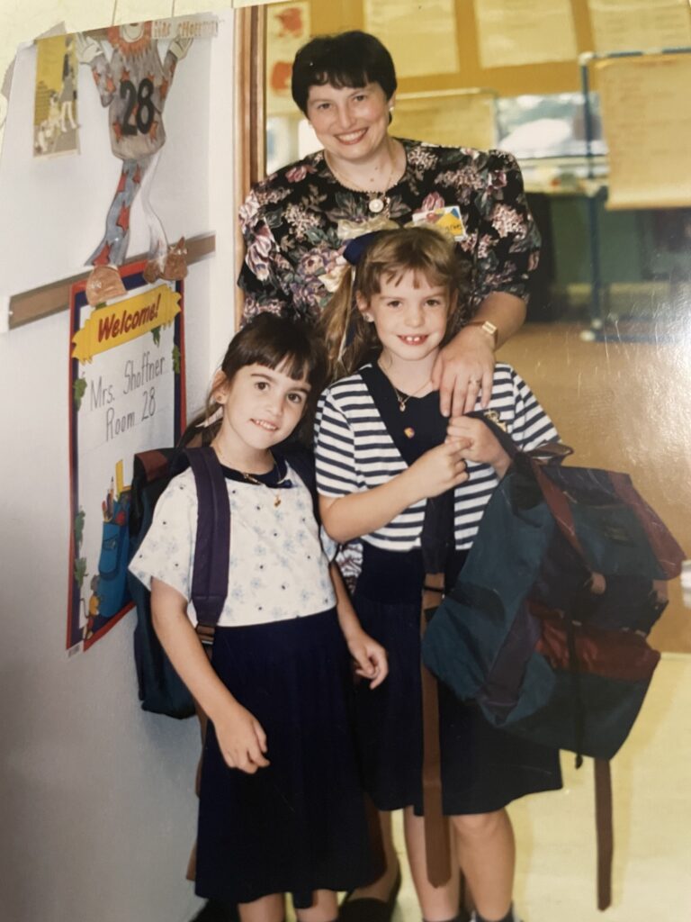 a teacher with 2 students