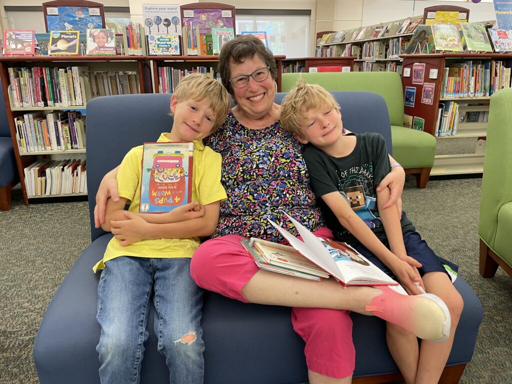 a teacher with two students